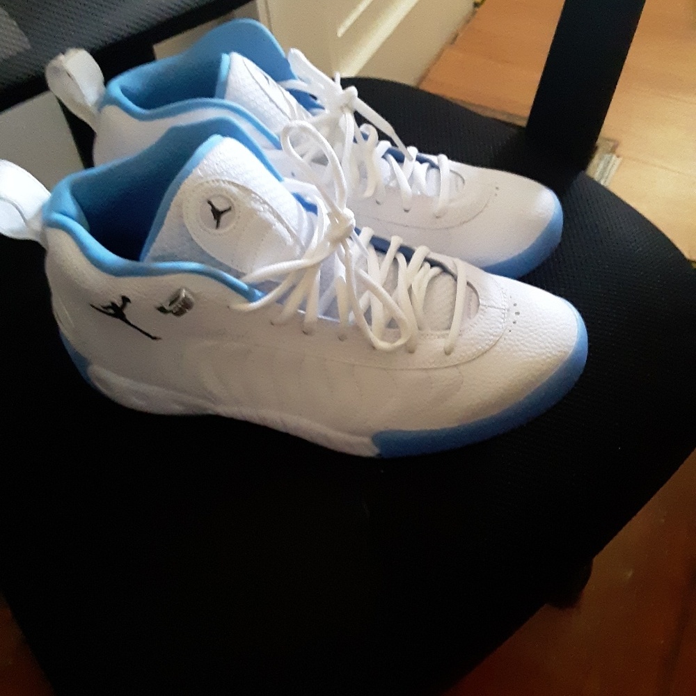 White/north Carolina blue jump and Jordans